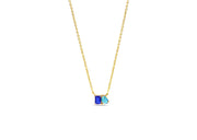 Close-up of Toi et Moi pendant ladies sapphire necklace showing both gemstones